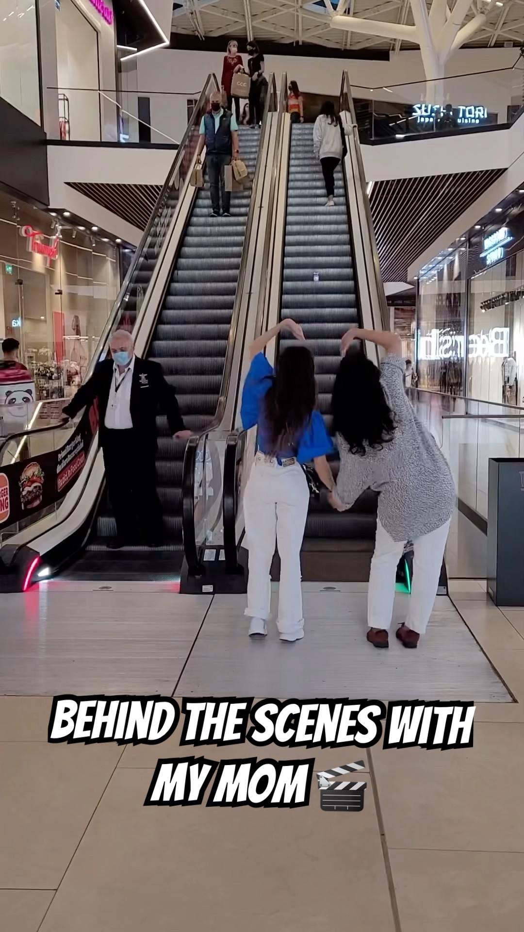 Dancing on the escalator with my mom ? | Andra Gogan